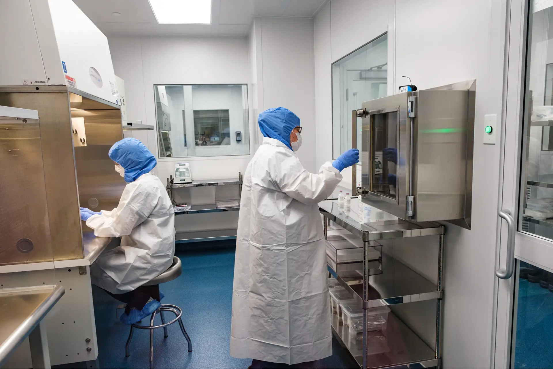 two compounding pharmacists in a lab