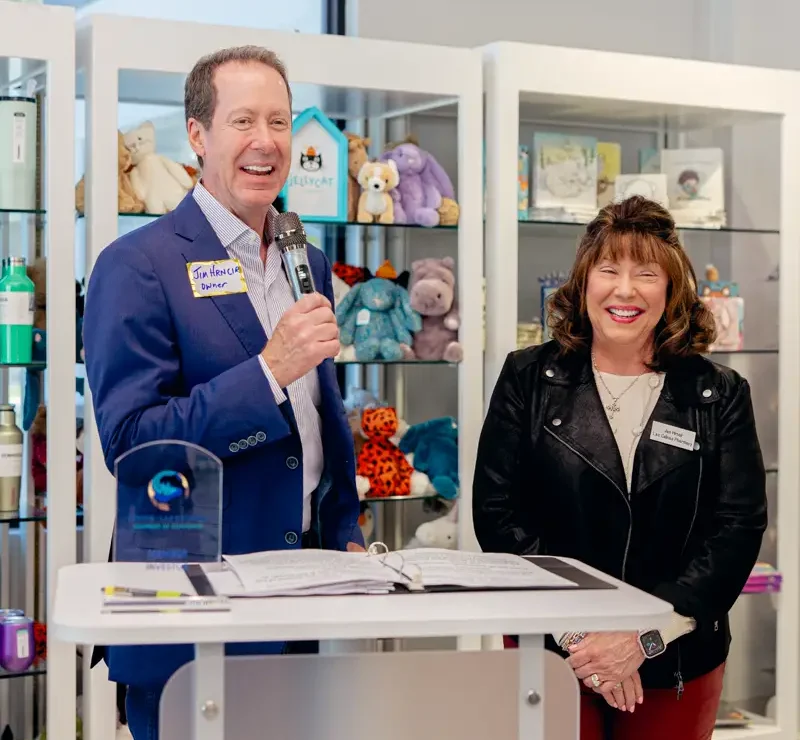 two people standing in pharmacy